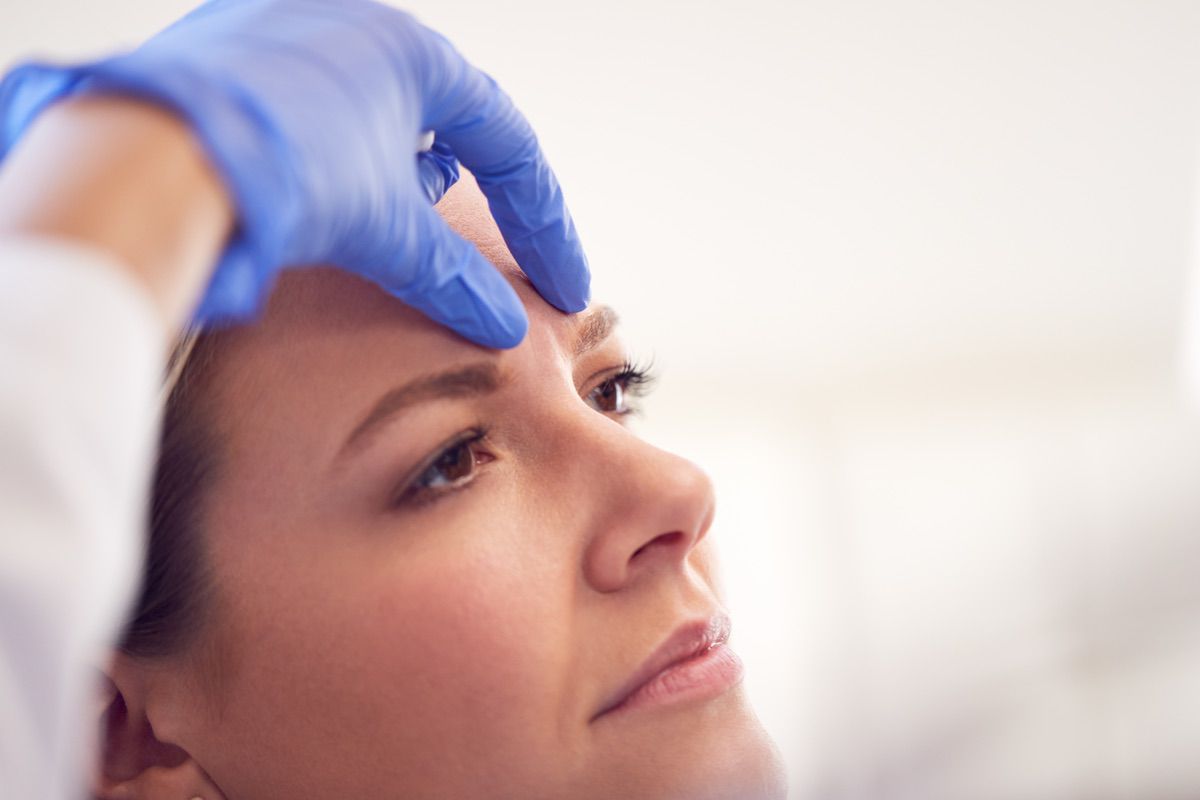 botox injection woman forehead